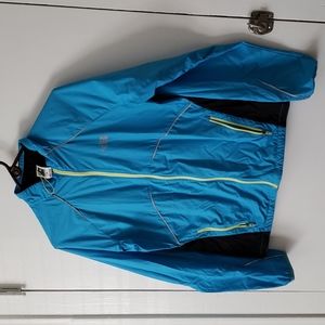 The North Face womens biking/running windbreaker size M. Reflecting strips